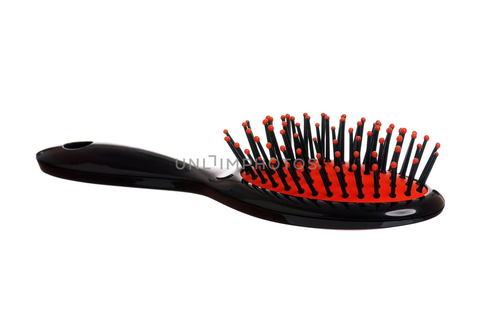 Black hairbrush by fotostok_pdv