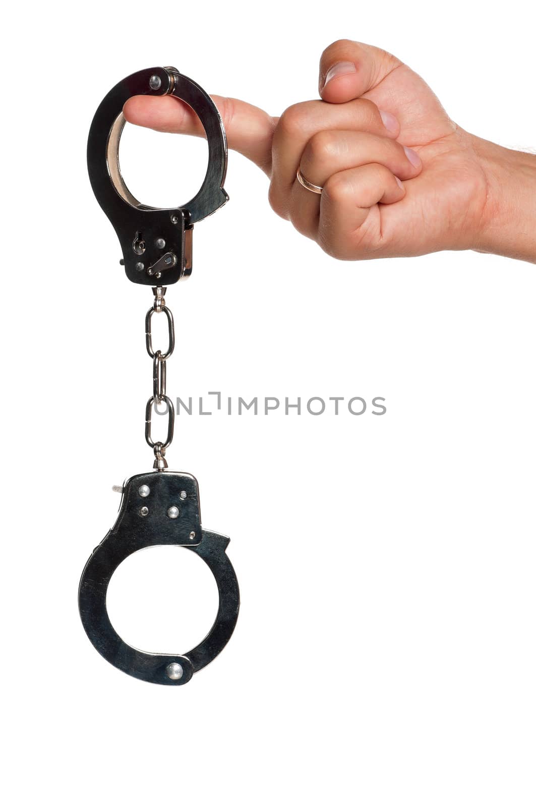 Hand with handcuffs by fotostok_pdv