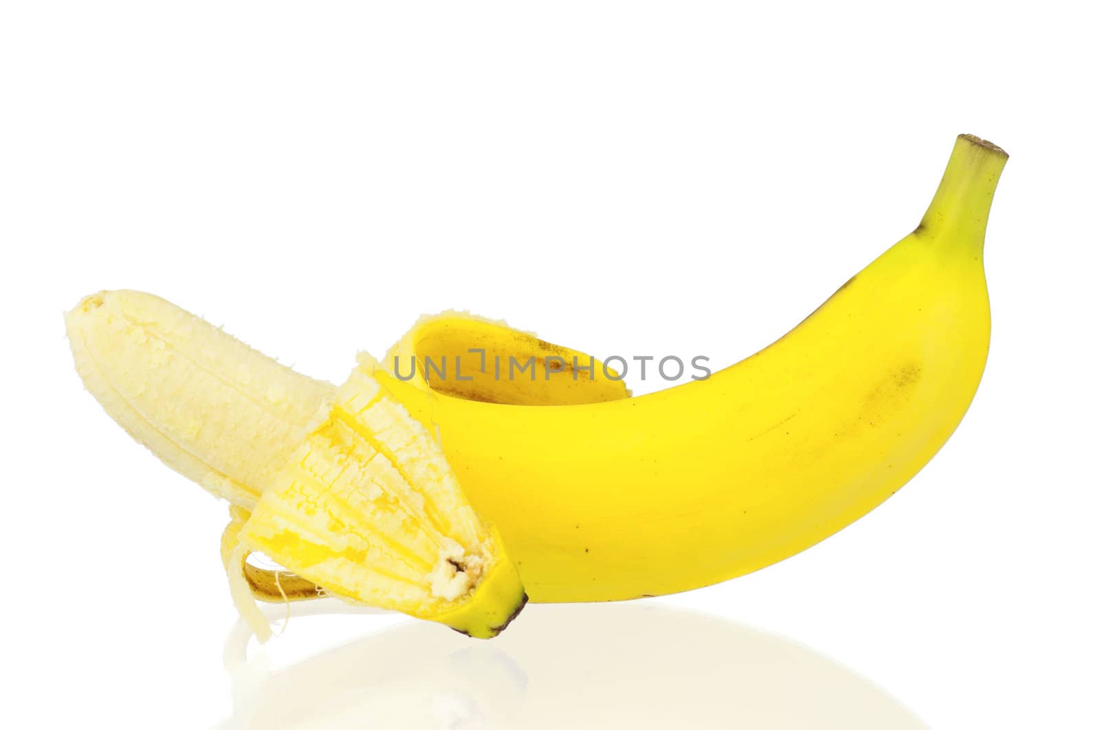 Open ripe banana isolated on white background