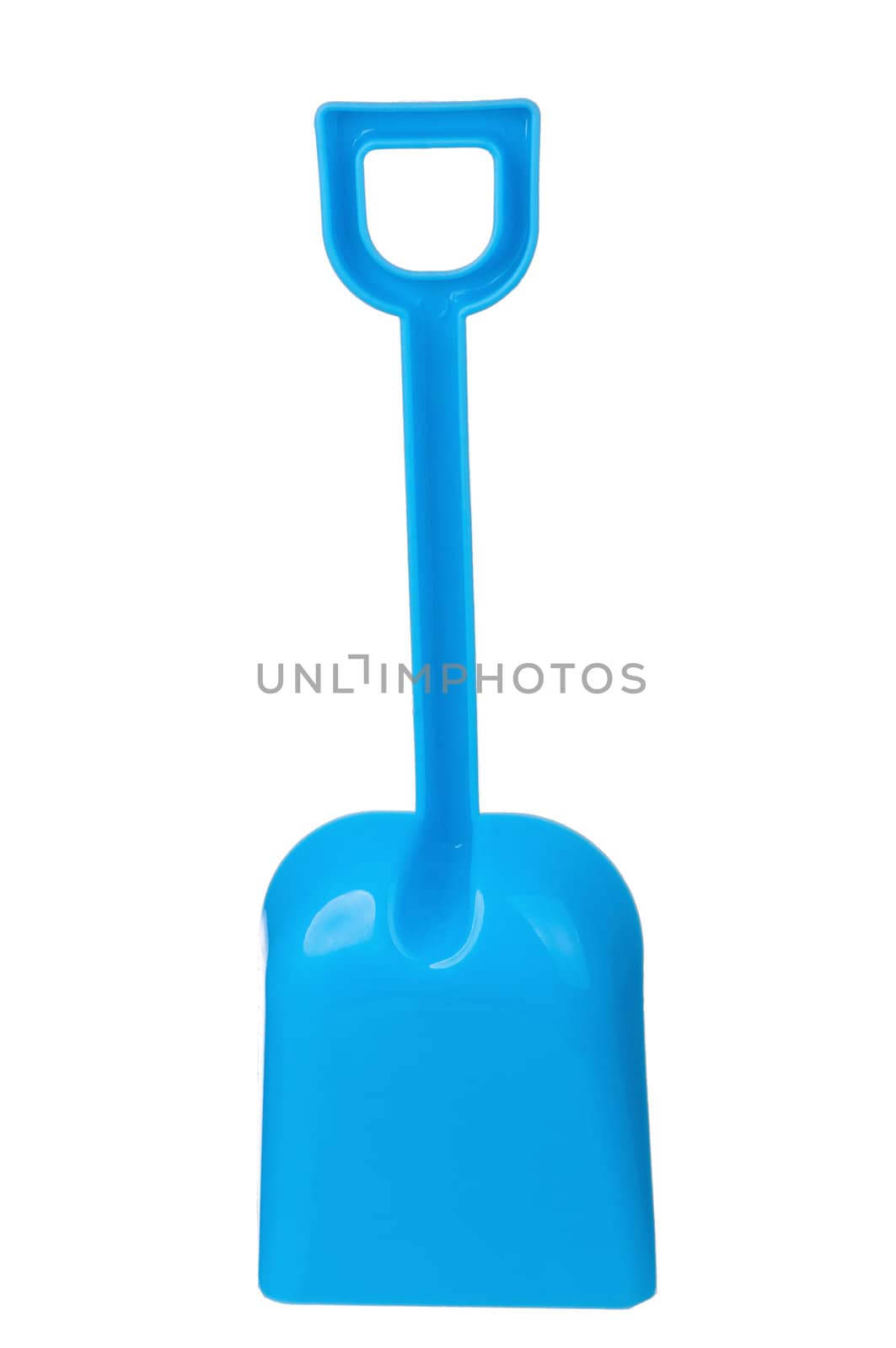 Toy small spade isolated on white background