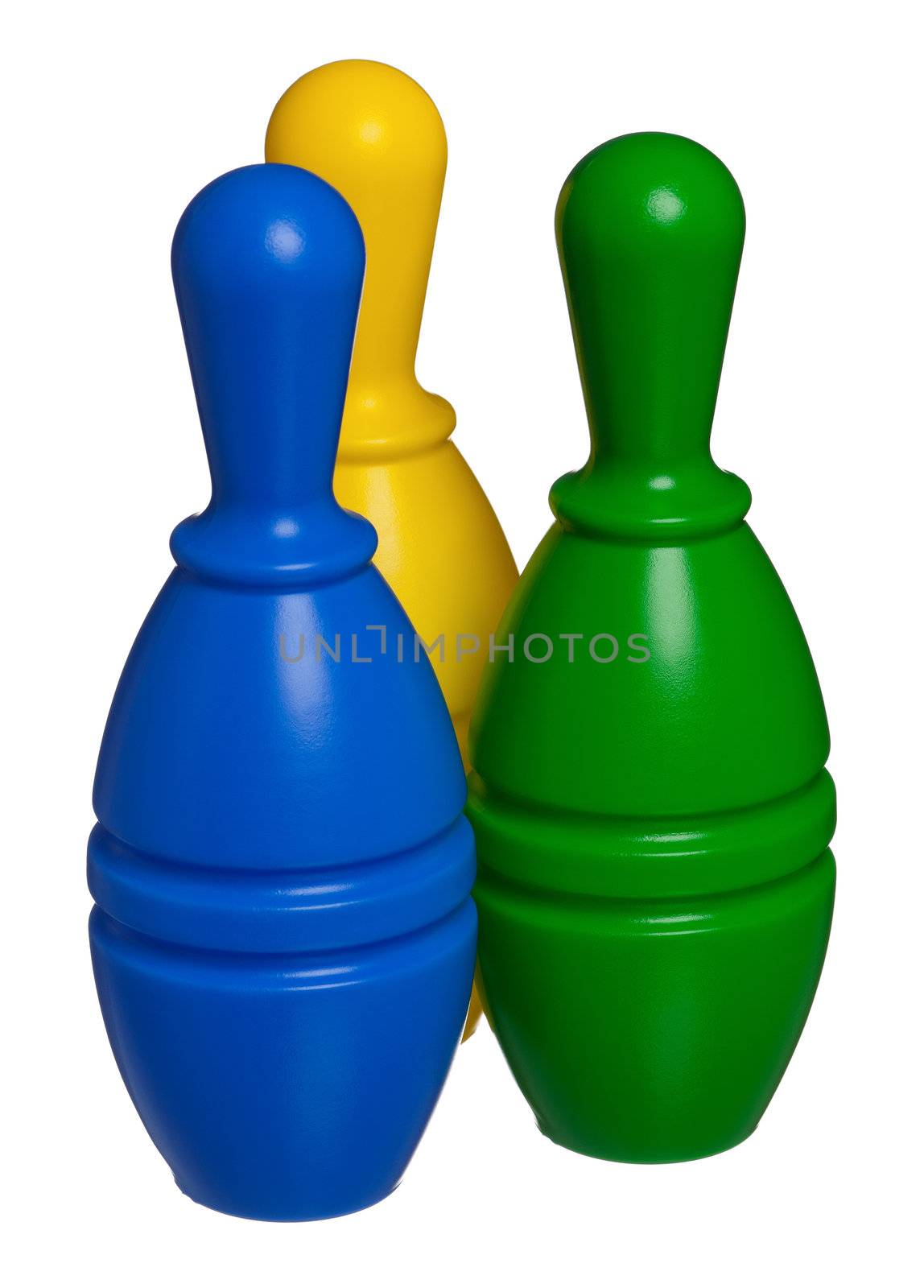 Colorful plastic skittles of toy bowling isolated on a white background