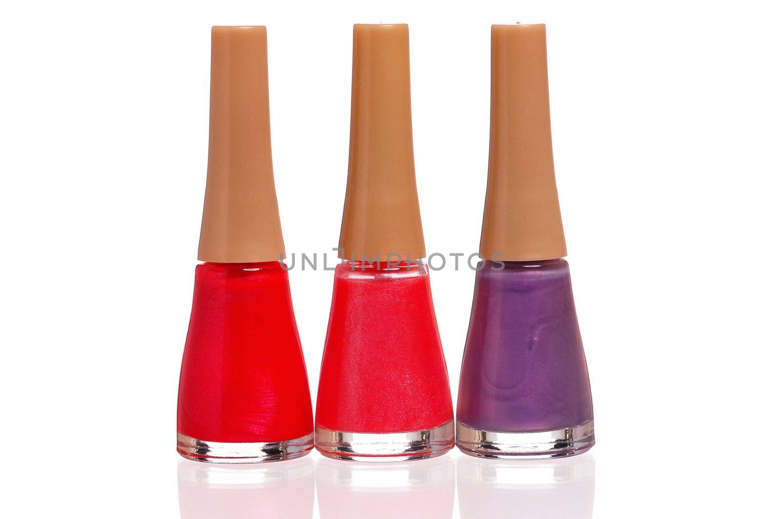 Three bottles of nail polish isolated on white background