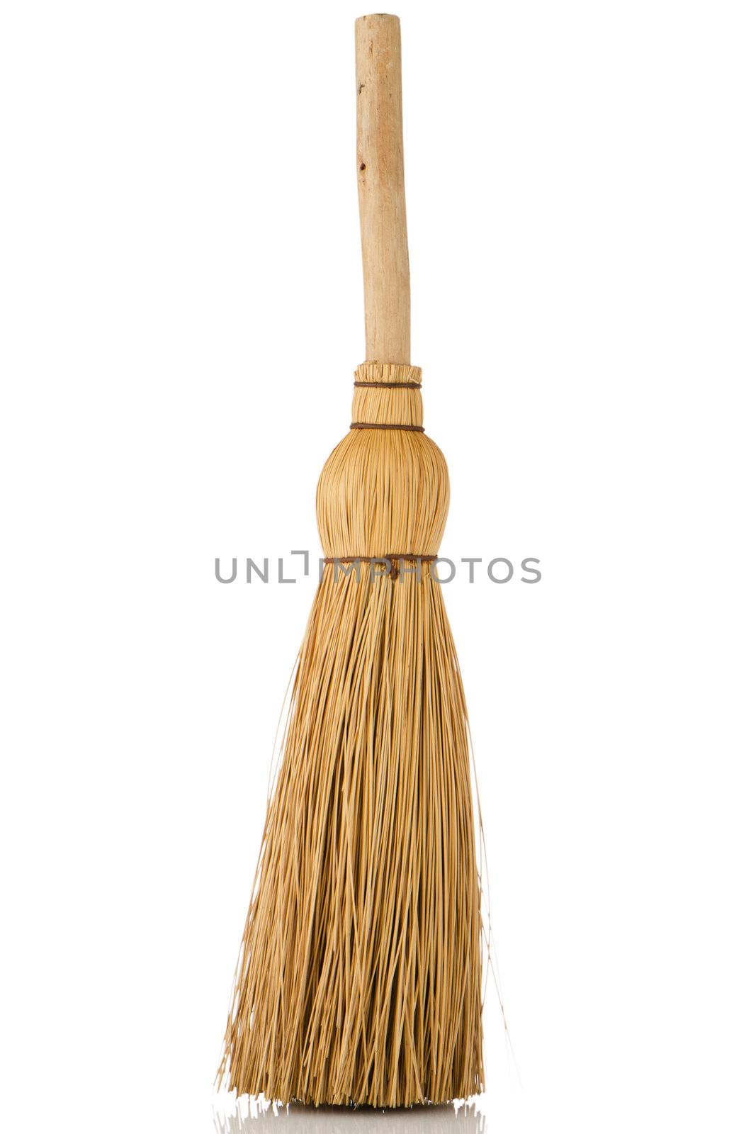 Whisk broom with reflection isolated on white background