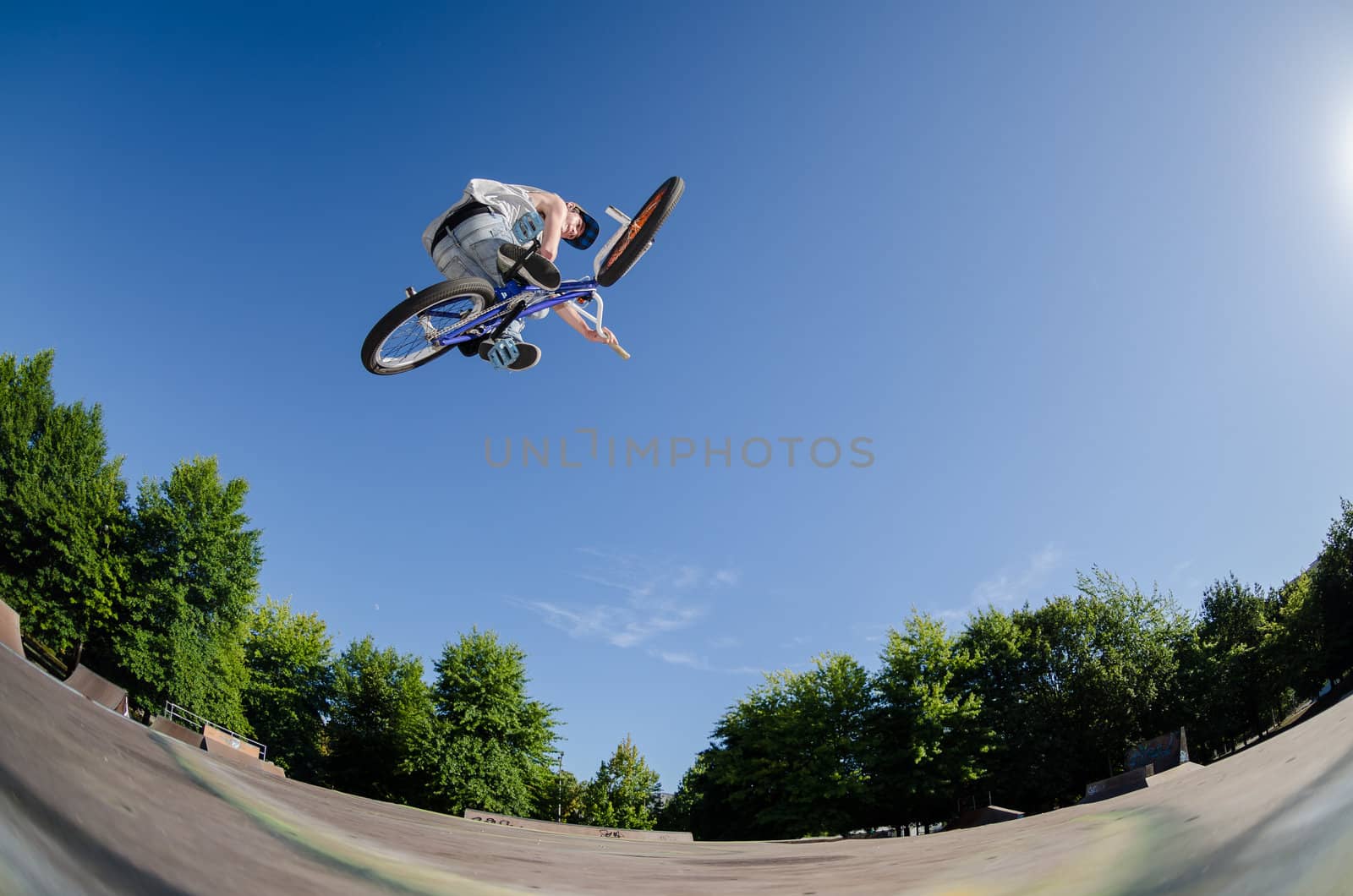 High BMX jump in a skate park.