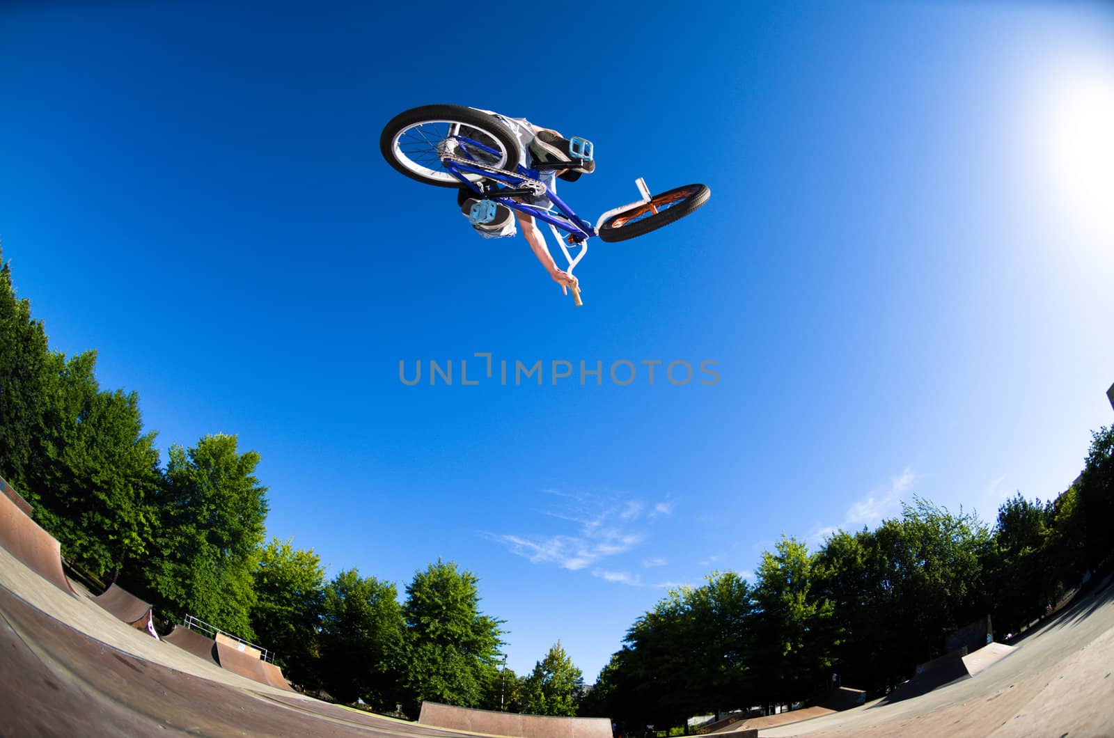 High BMX jump in a skate park.