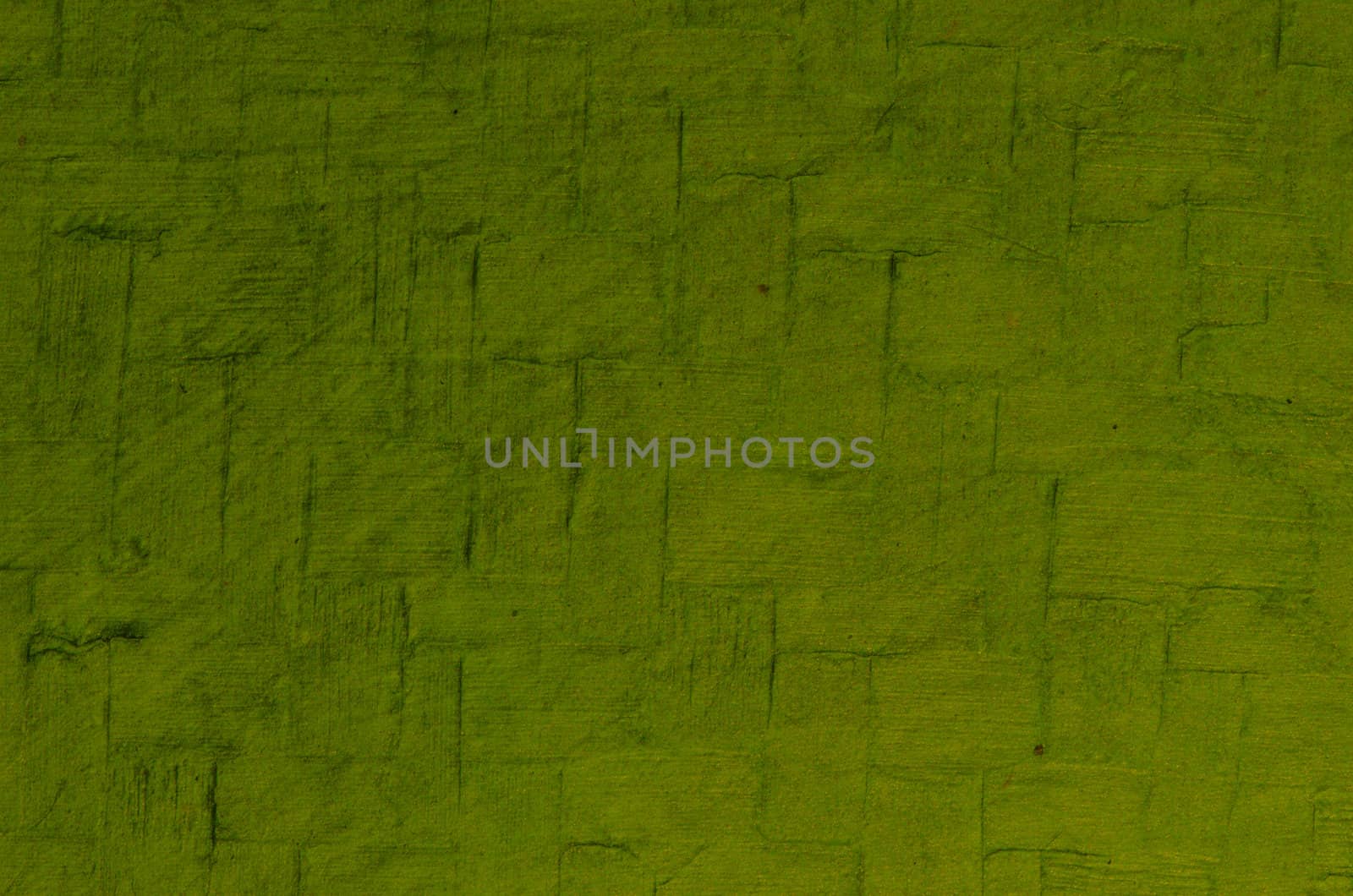 Closeup detail of beautiful green cracked background texture.
