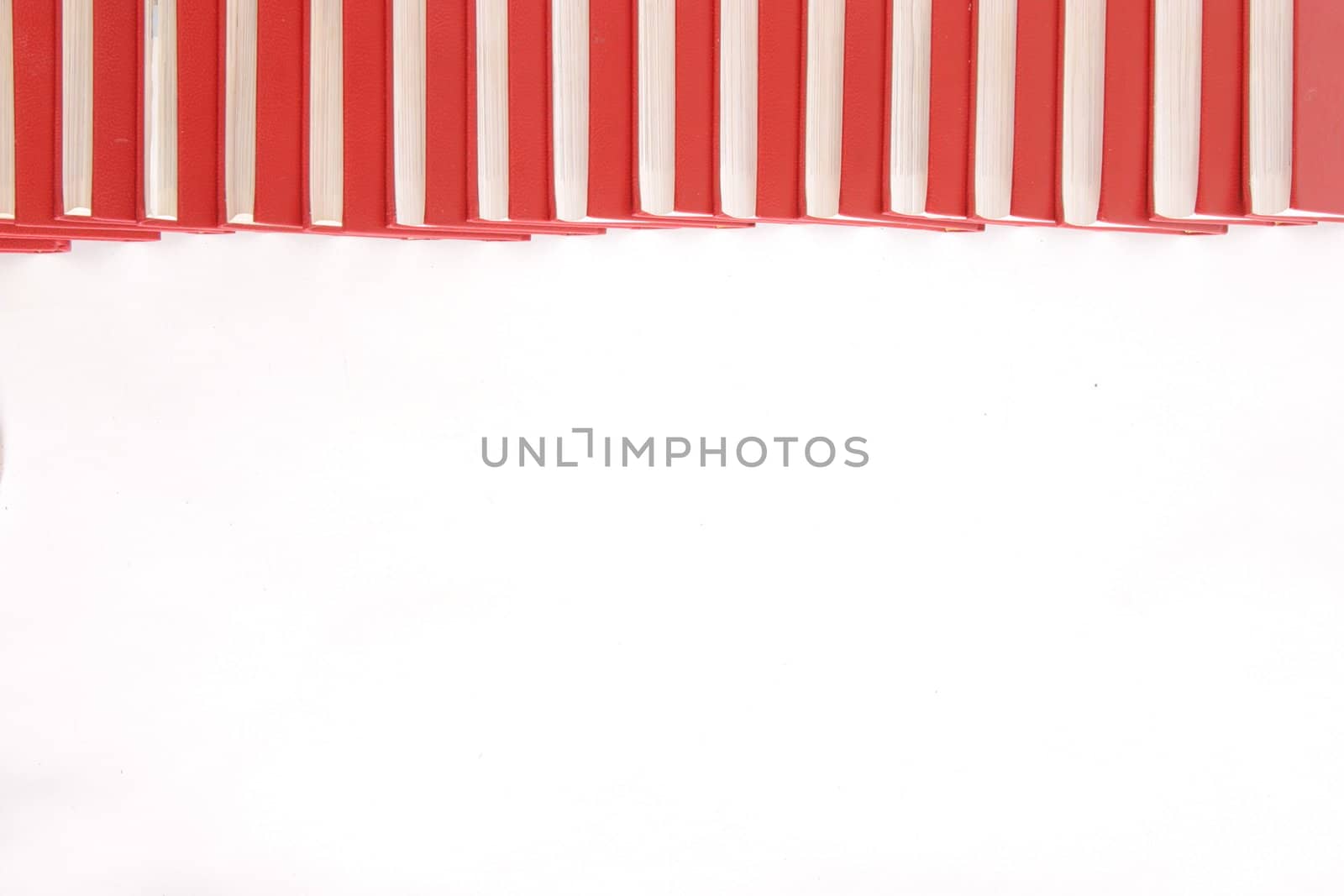 stack of red books isolated on white