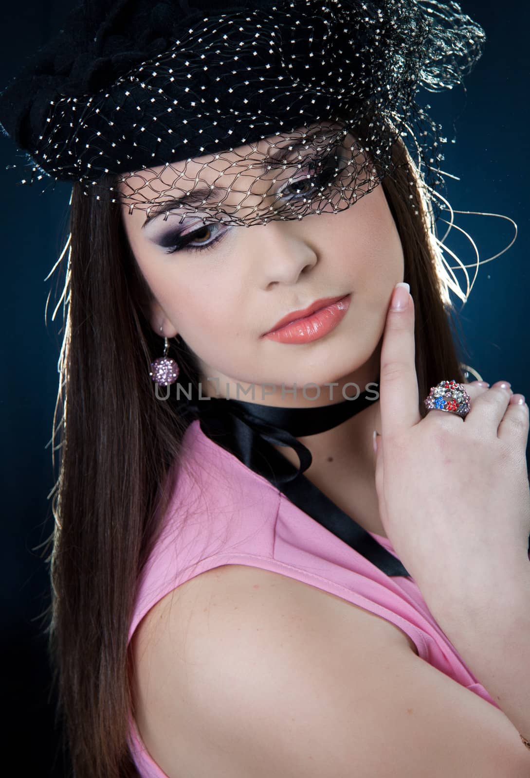 beautifull brunette , shooting in the studio with dark background 