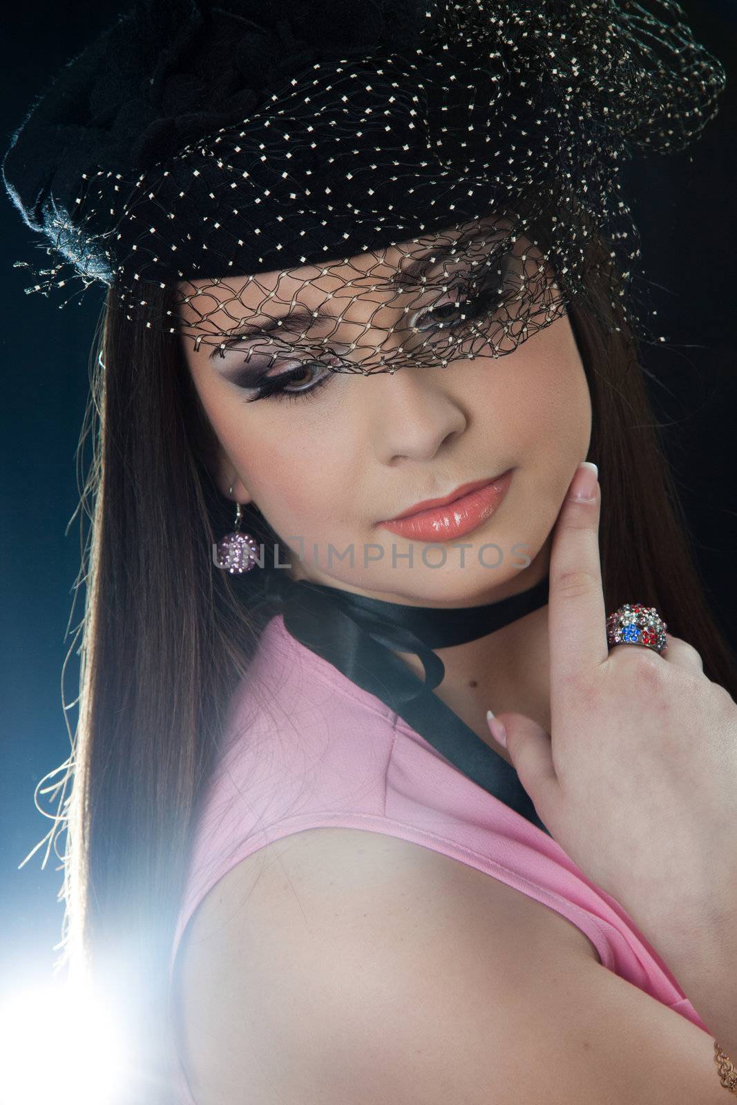 beautifull brunette , shooting in the studio with dark background 