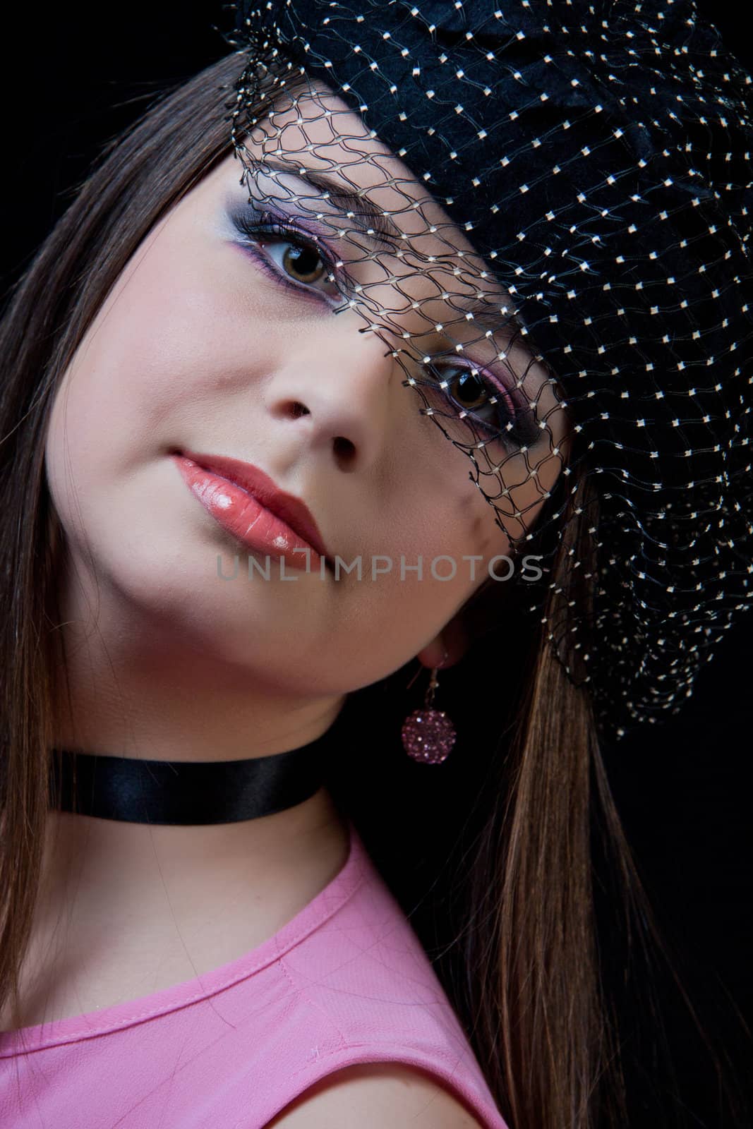 beautifull brunette , shooting in the studio with dark background 