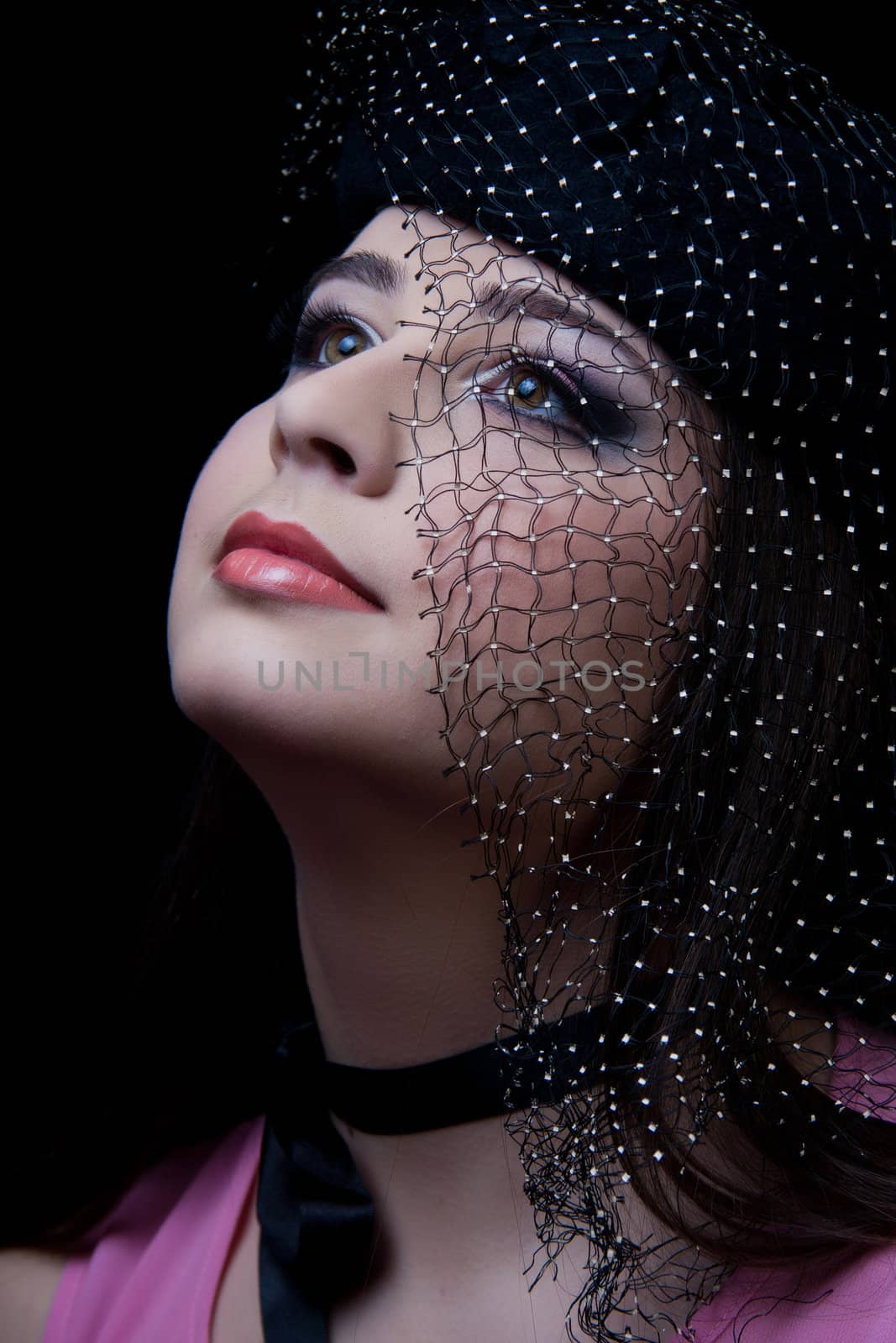 beautifull brunette , shooting in the studio with dark background 