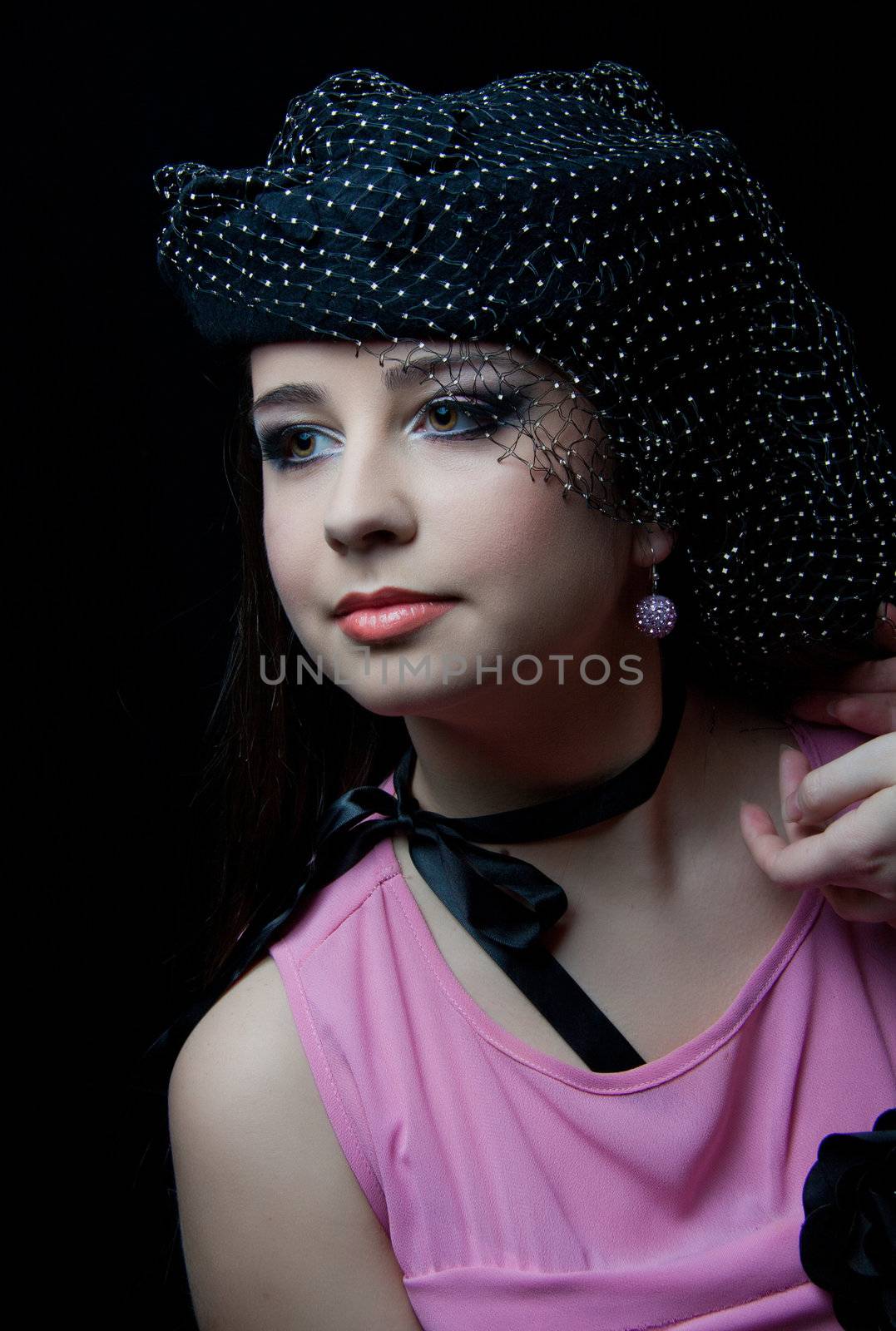 beautifull brunette , shooting in the studio with dark background 