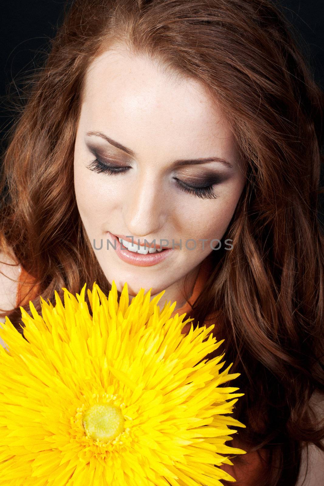 a close-up portrait with a professional makeup 