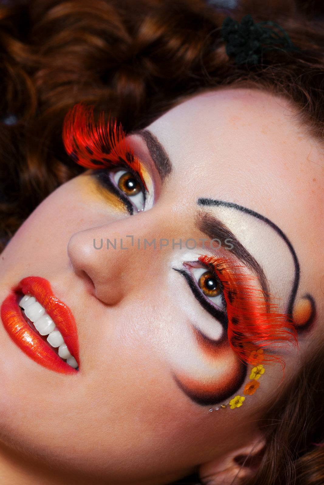 a close up portrait of a pretty redhead girl with professional makeup