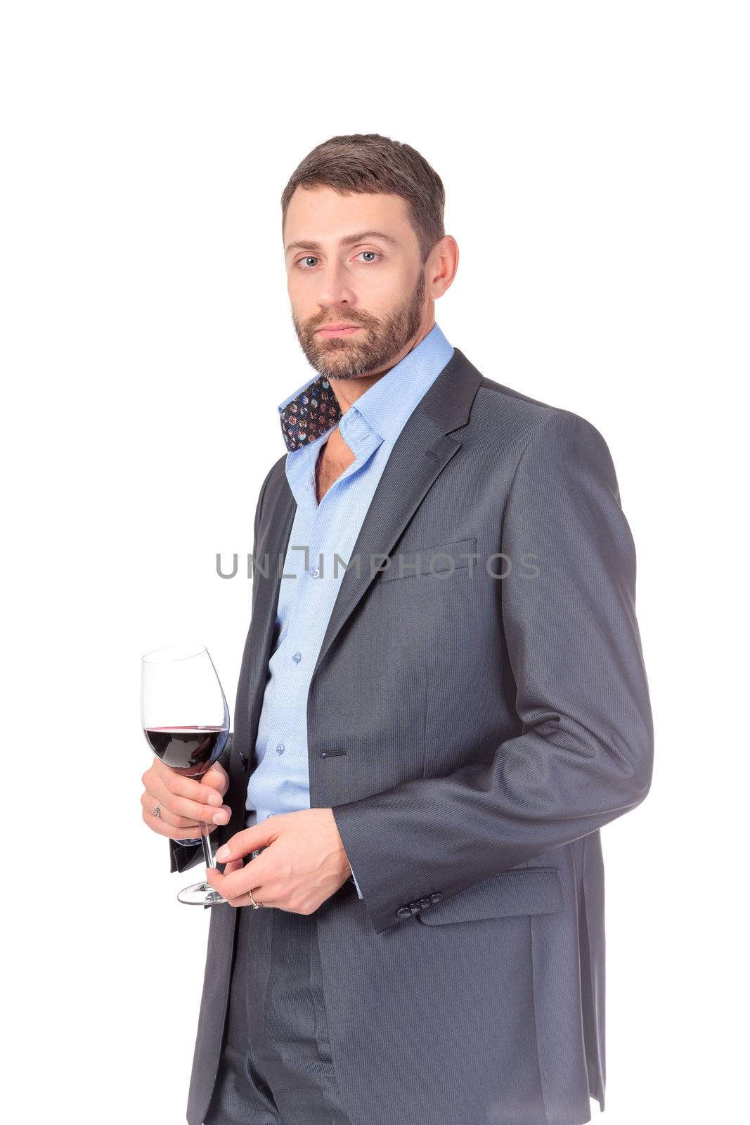 Portrait of thoughtful business man with glass wine by Discovod