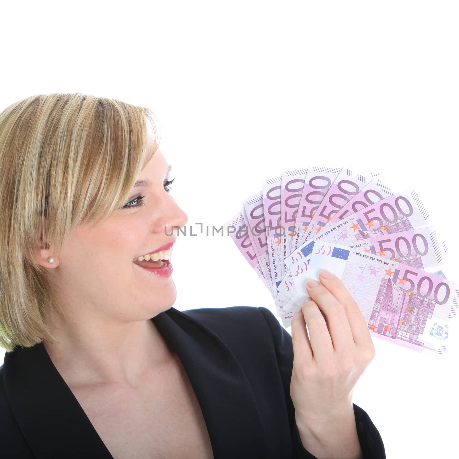 A young blonde woman smiles at a fanned-out handful of five hundred euro notes