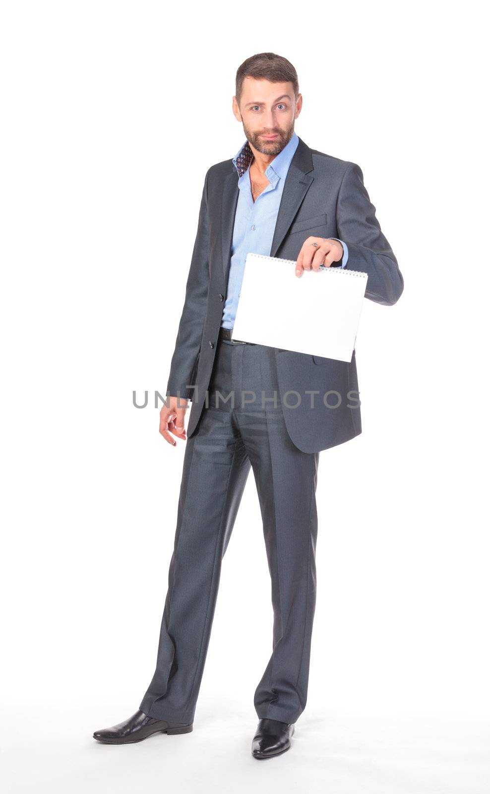 Full length portrait businessman showing an empty board to write, over white background
