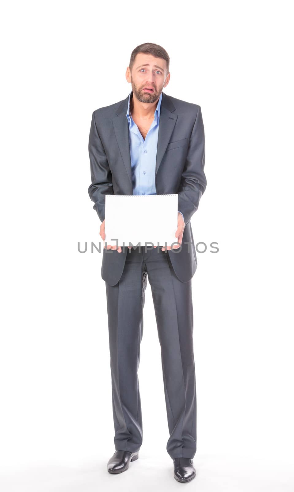 Full length portrait businessman showing an empty board to write, over white background