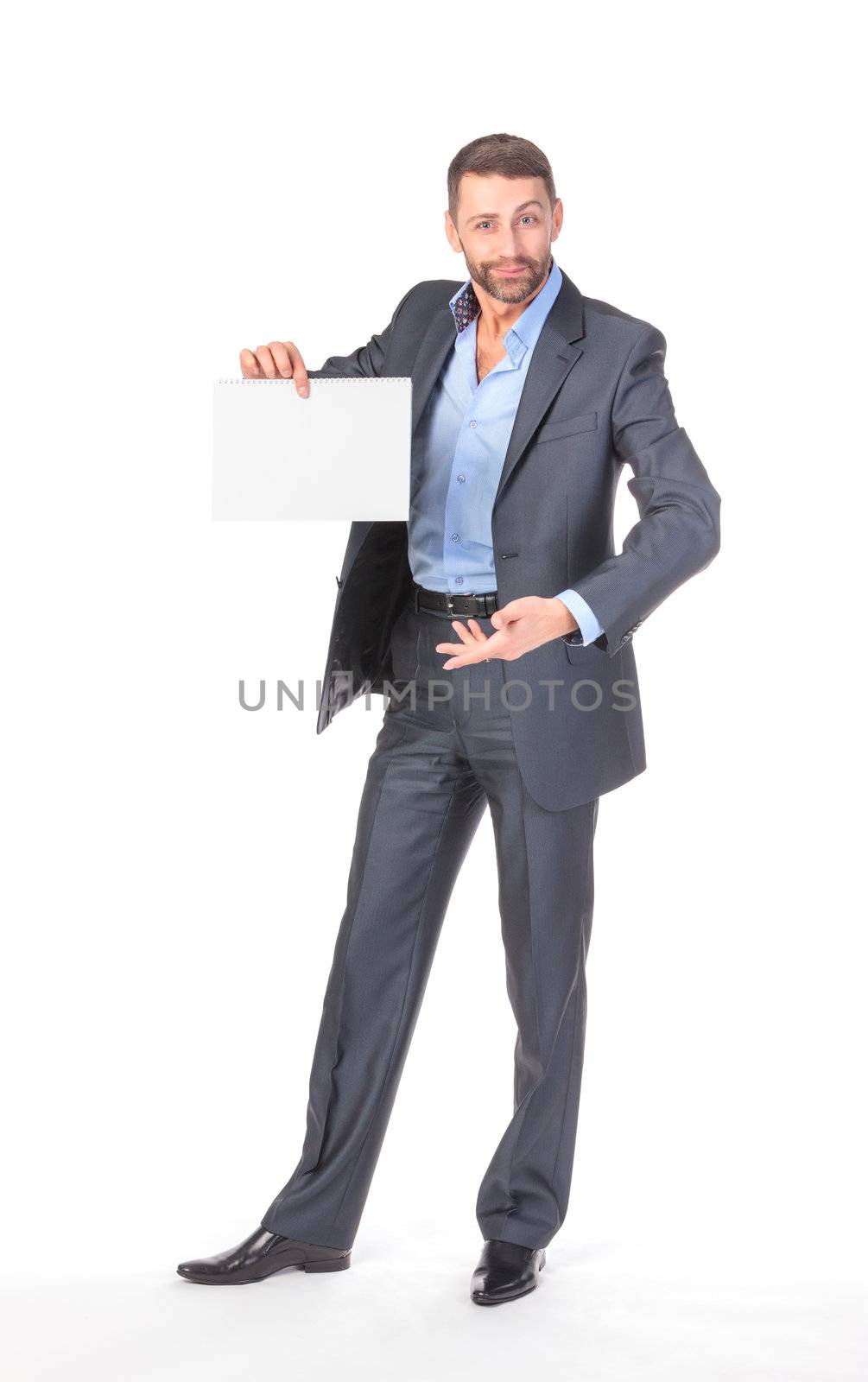 Full length portrait businessman showing an empty board to write by Discovod