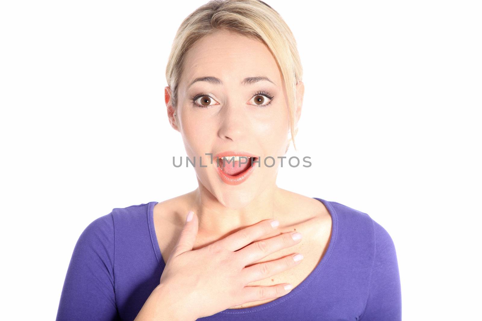 Portrait of beautiful surprised young blonde woman hand on her chest