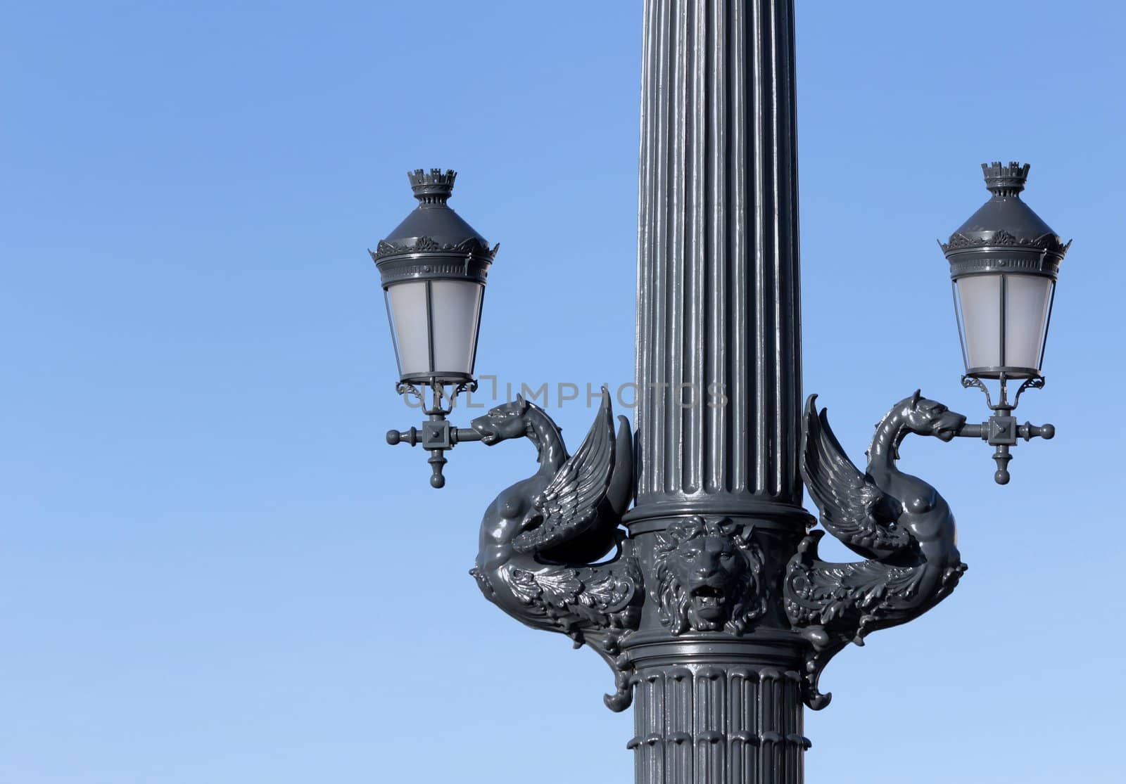 Double ornate street lamps.