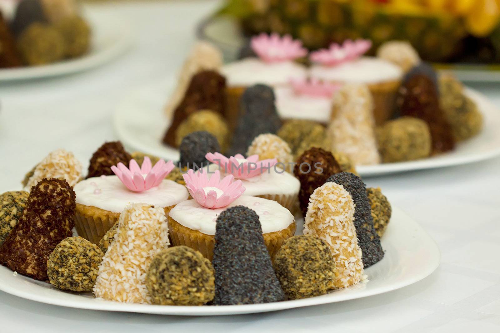 A close up picture of a plate with sweets