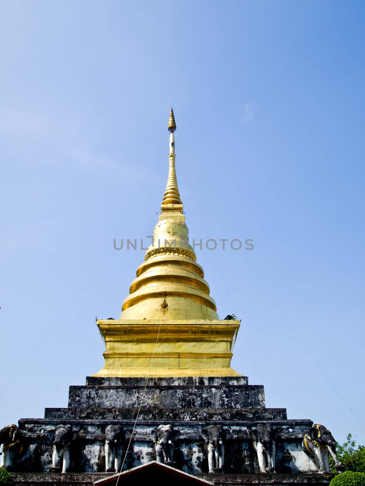Golden stupa in Traditional Thai style which is in Wat Changkum  by gjeerawut