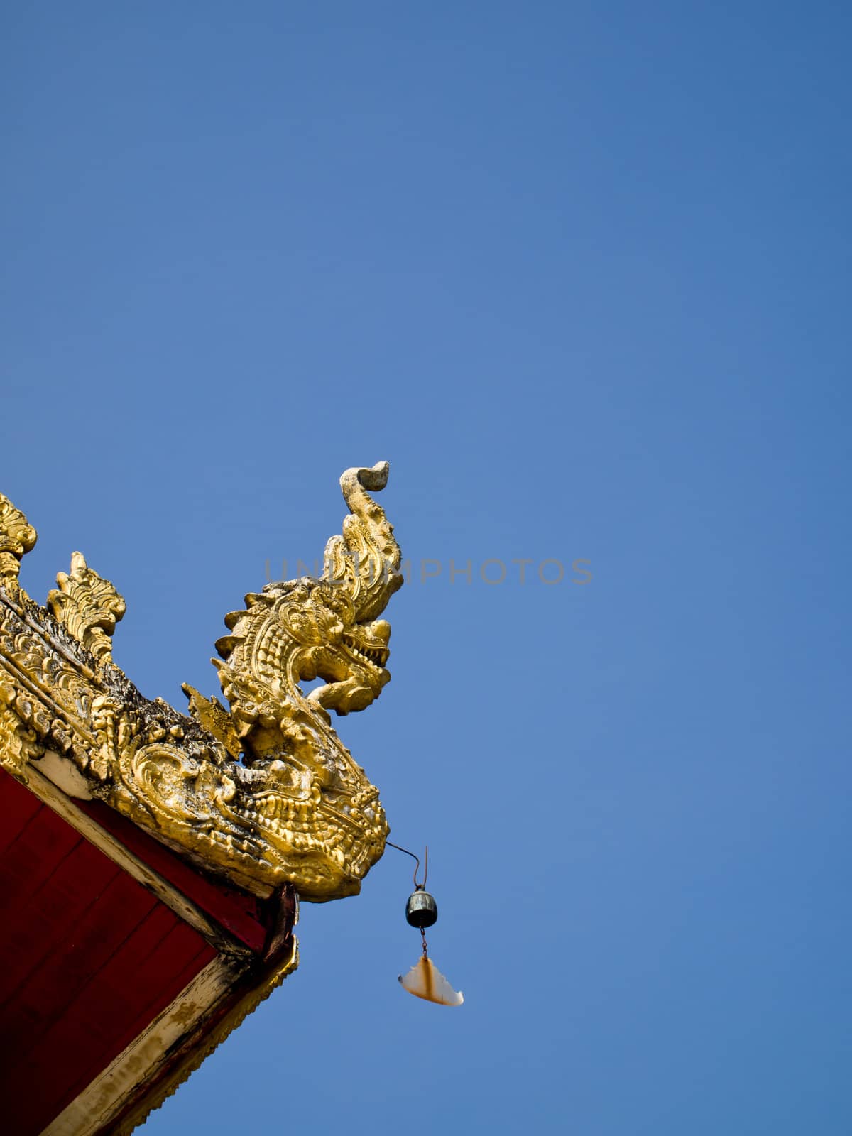 Golden Naga gable apex which is in Wat Suantan (Nan-Thailand)