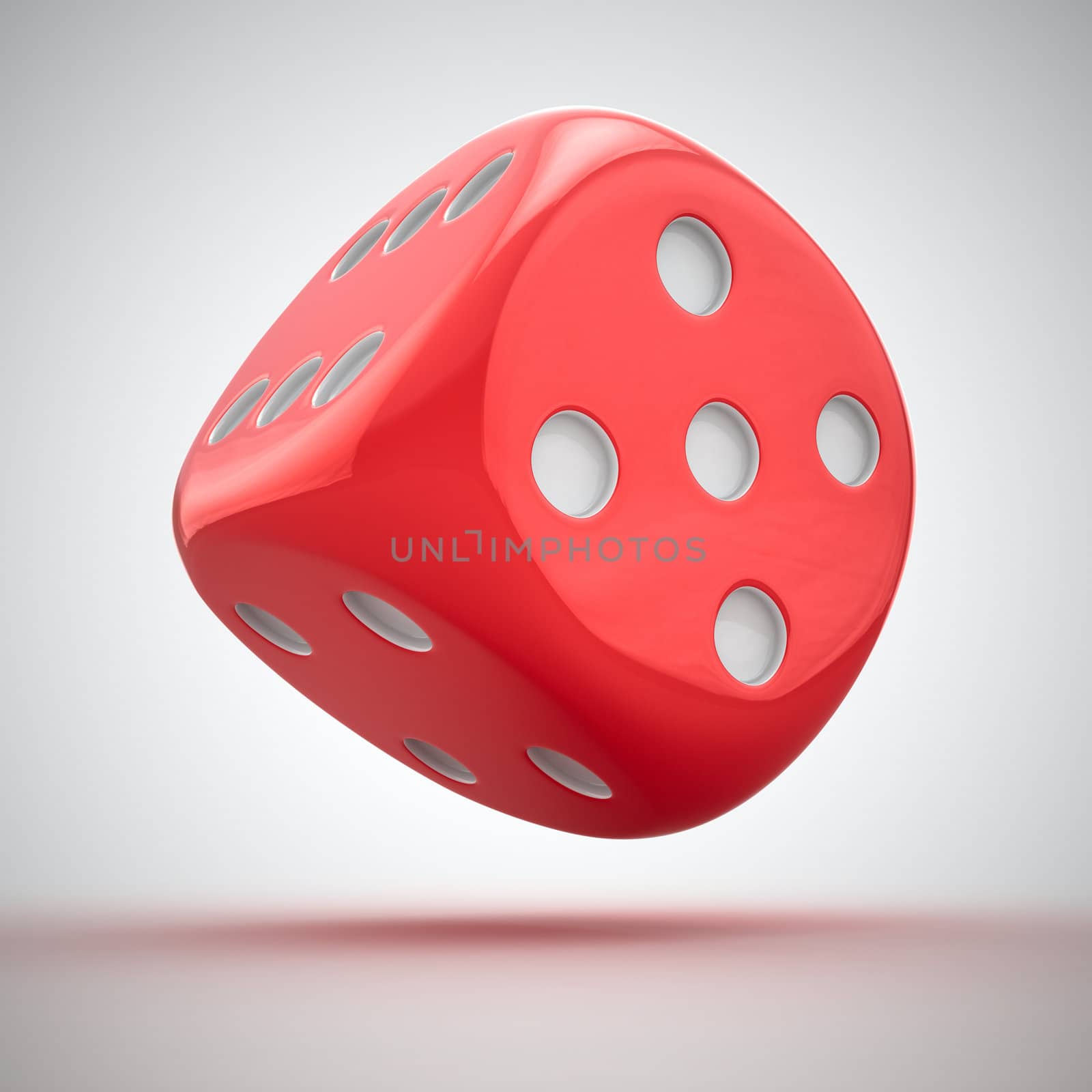One big red dice on the white background