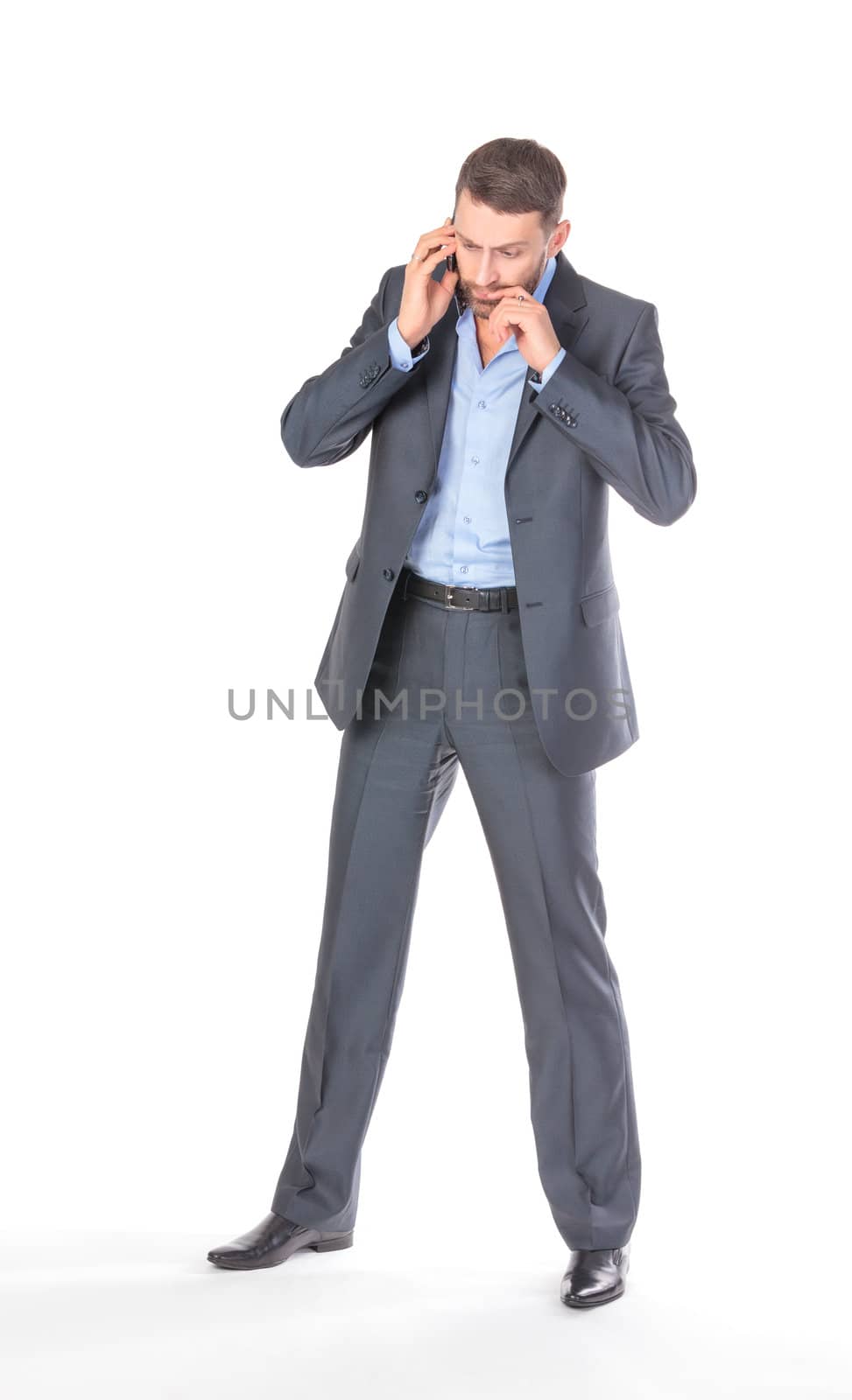 Full length portrait businessman with mobile phone by Discovod