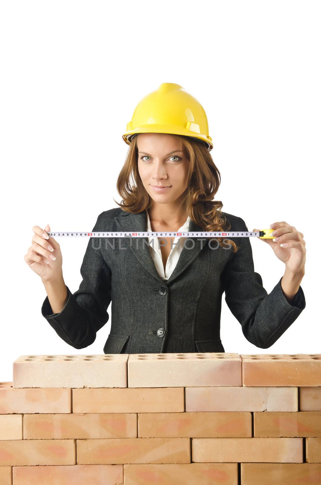 Woman architect near brick wall
