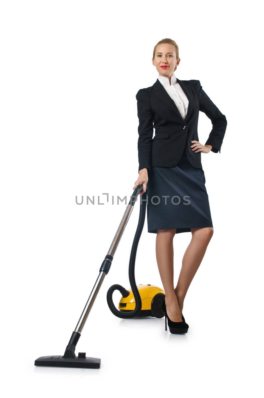 Businesswoman doing vacuum cleaning on white