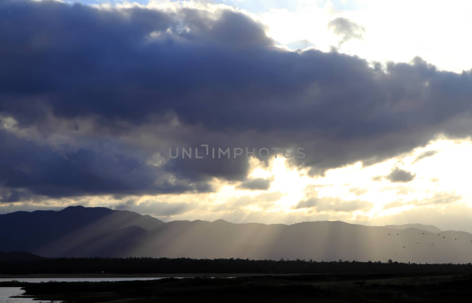 dramatic sunset over river