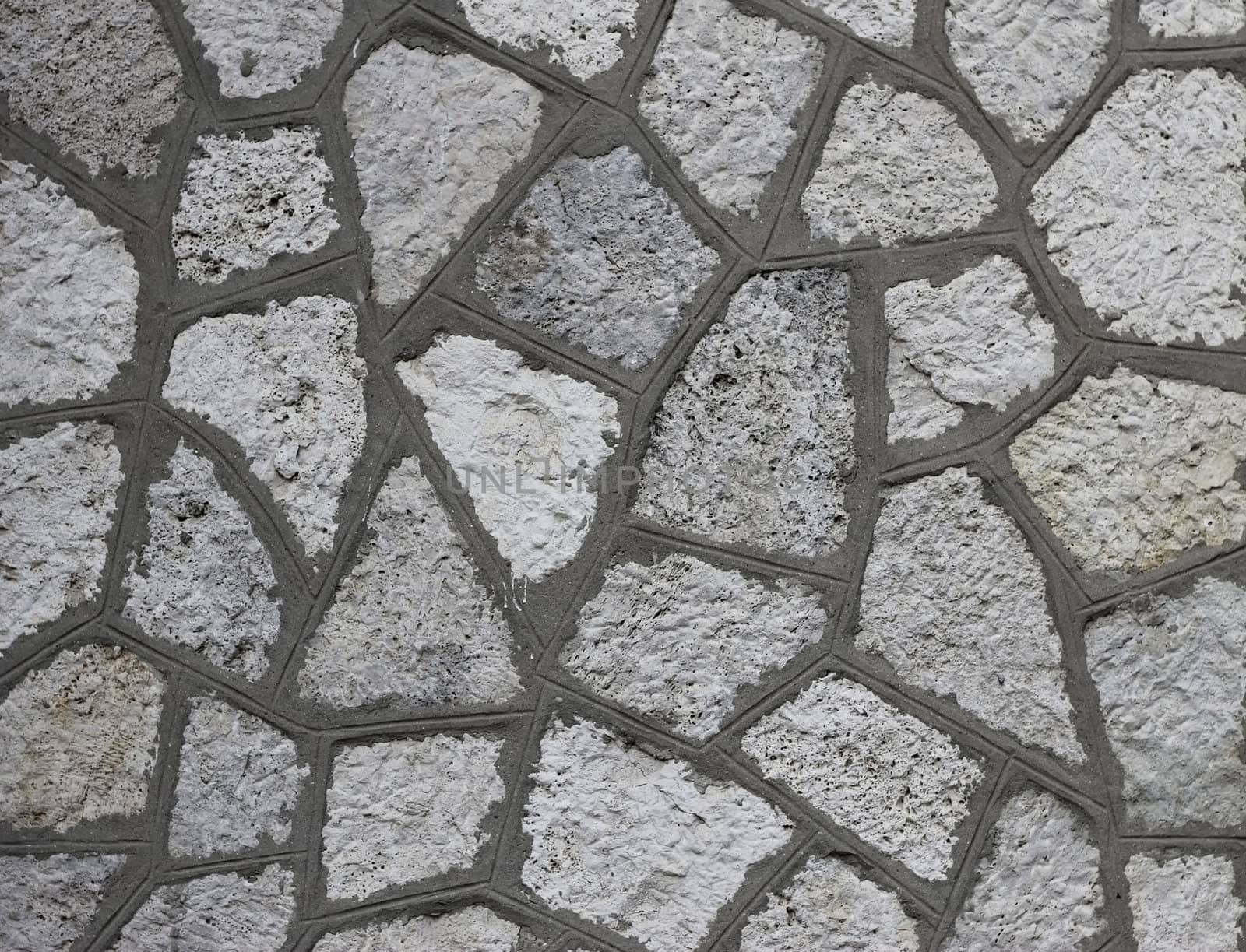 Rough gray bricks with a textured surface