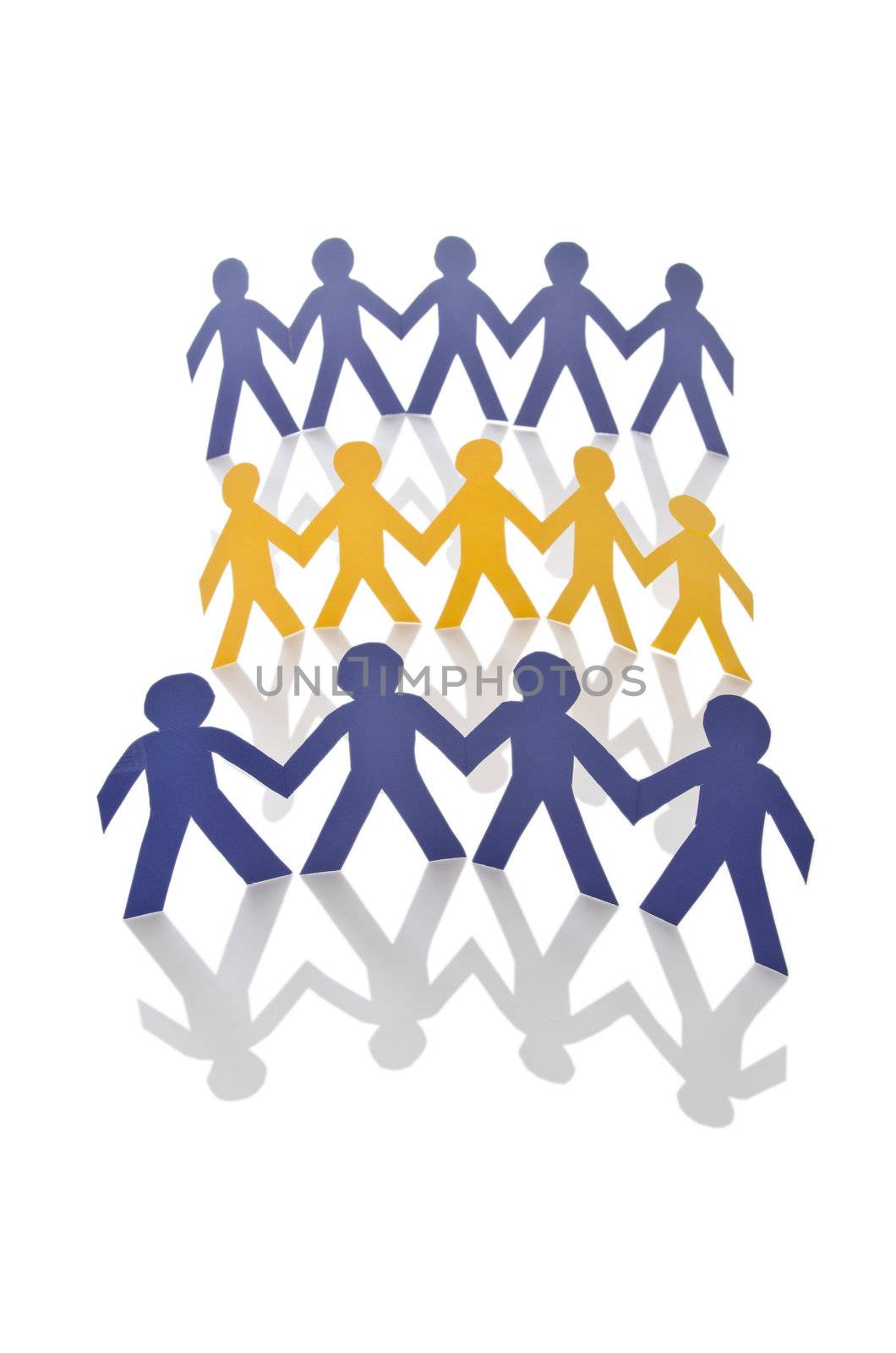 Teamwork concept with paper cut people by Elnur