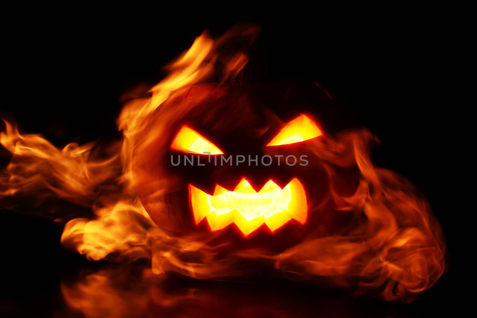 Halloween pumpkin in fire by rufatjumali