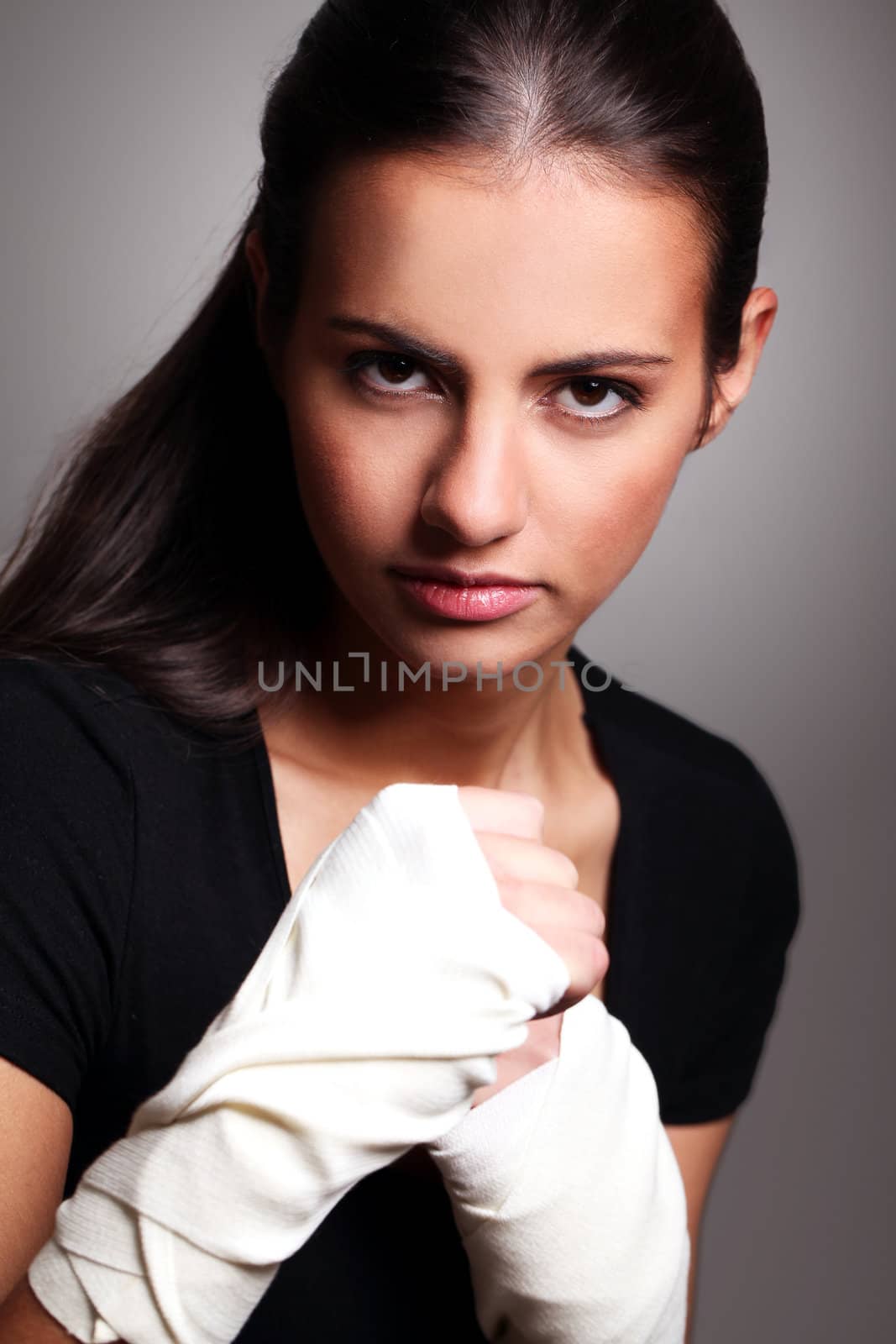 Portrait of beautiful woman ready for a fight