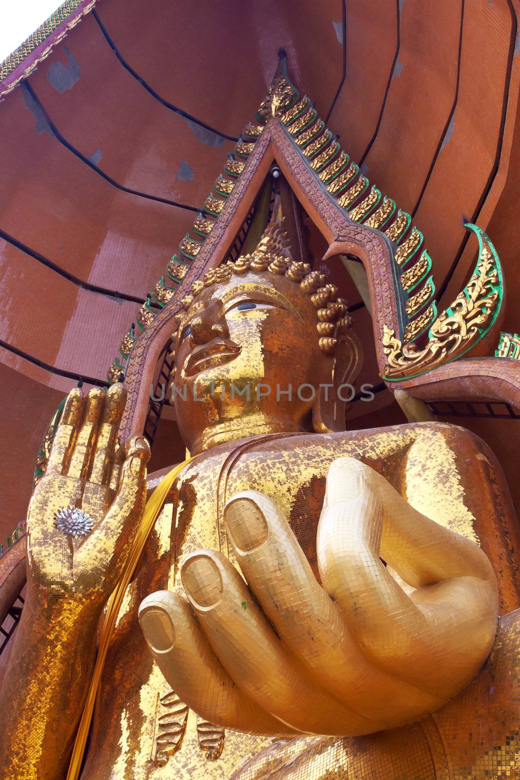 Golden buddha statue by Exsodus