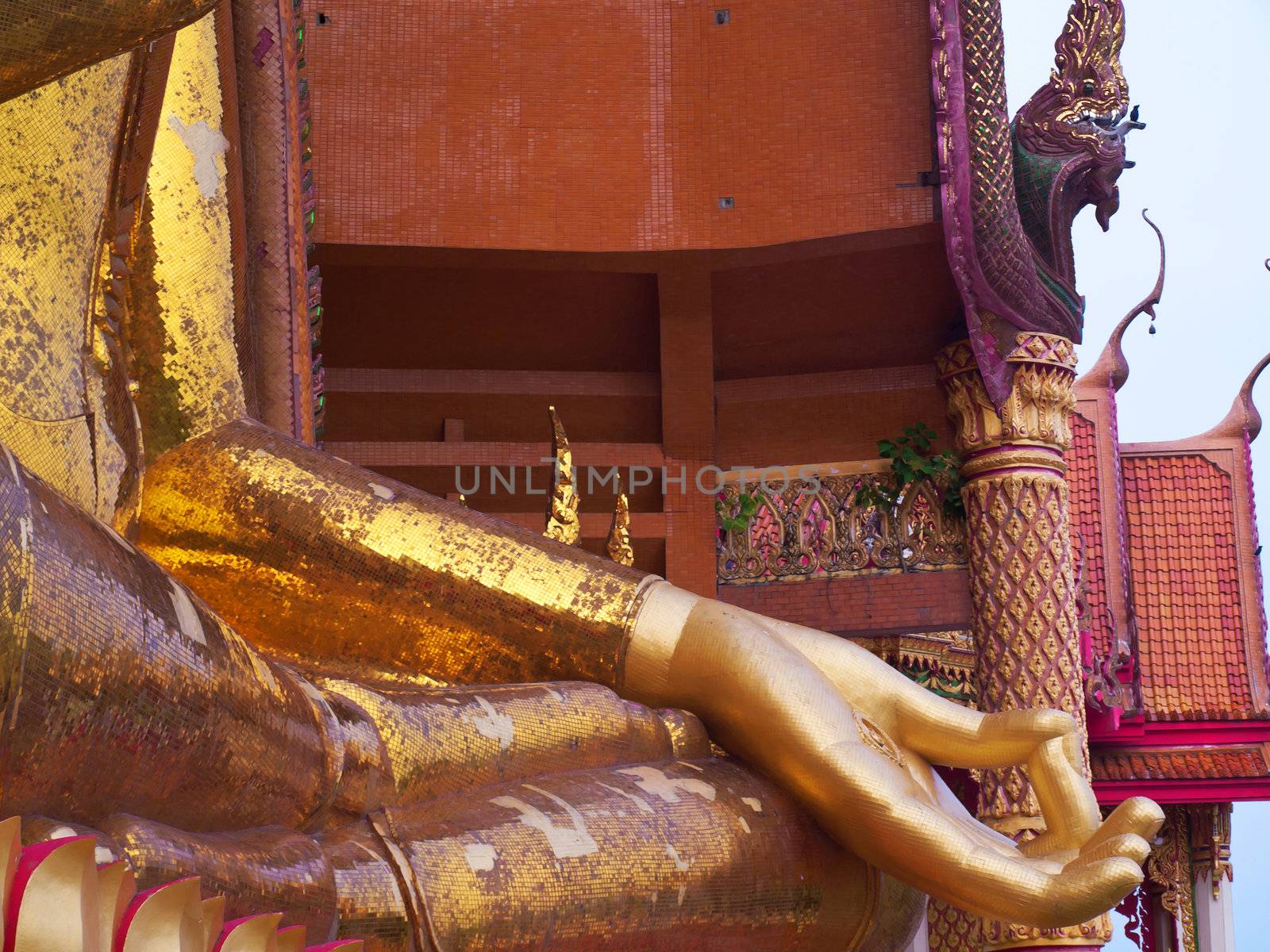 Golden buddha statue by Exsodus