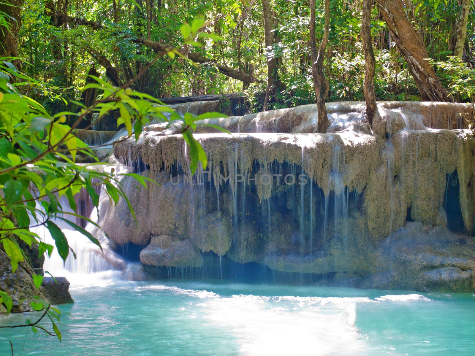 Emerald color water in tier fifth of Erawan waterfall, Erawan National Park, Kanchanaburi, Thailand