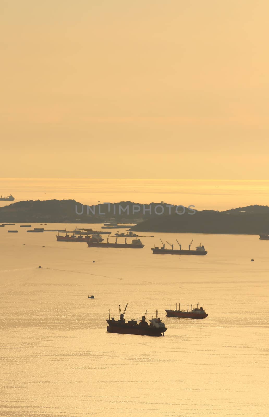 image of Cargo ship at twilight time.