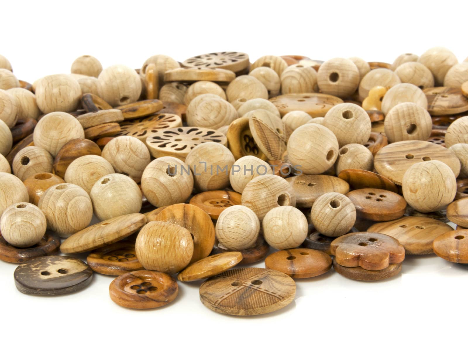 wooden tailor buttons isolated on white