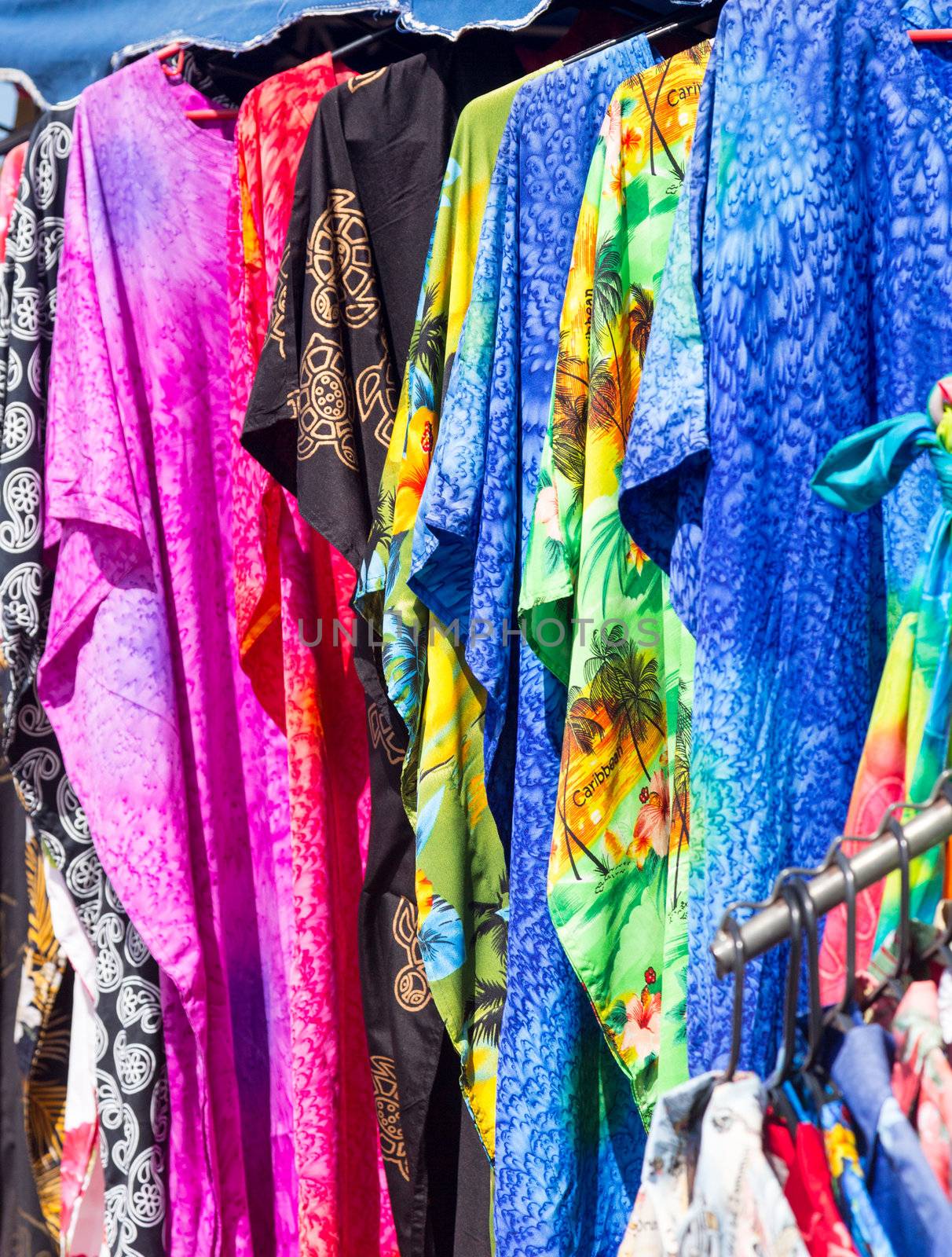 Close up of details of colorful clothing on street market stall