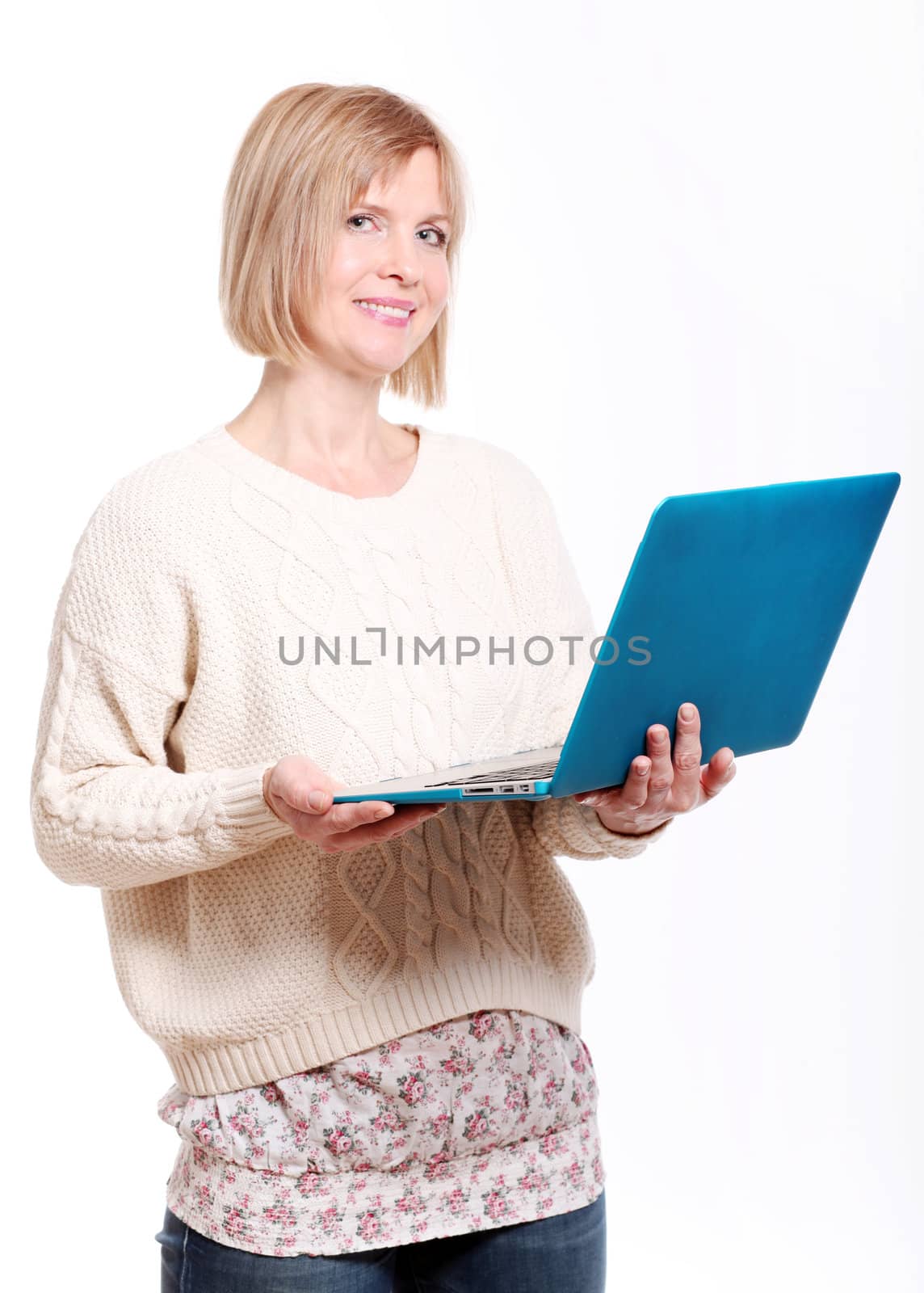 caucasian mid age woman with laptop on a white background