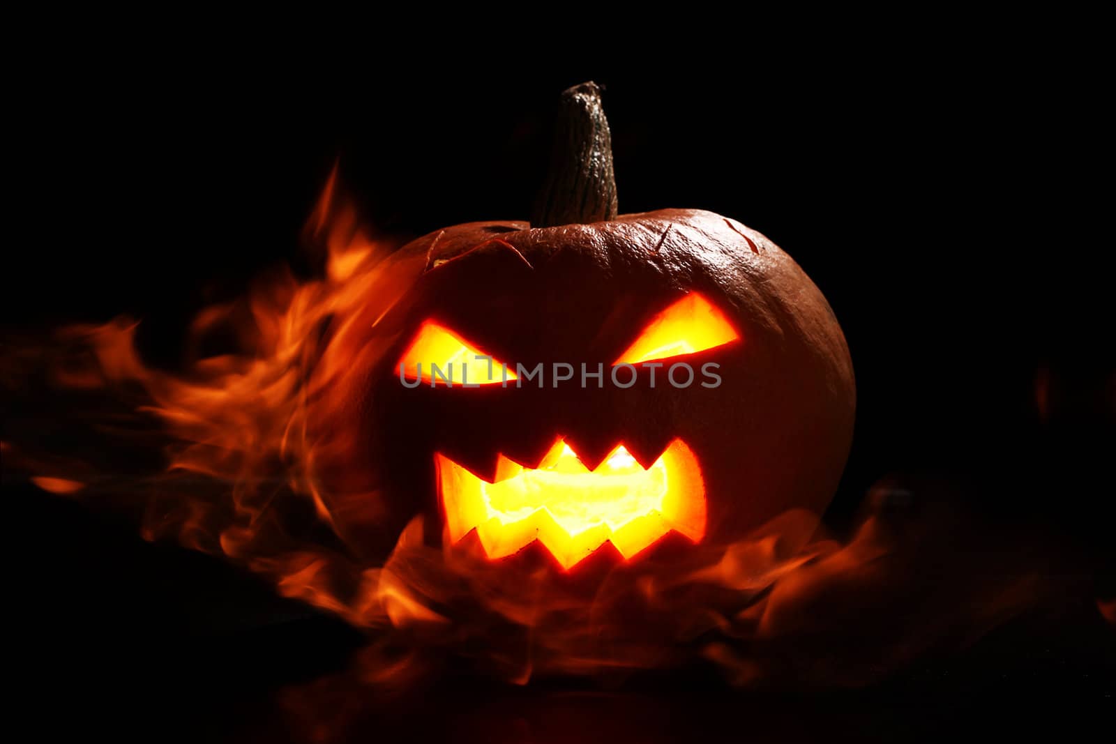 Halloween pumpkin in fire by rufatjumali