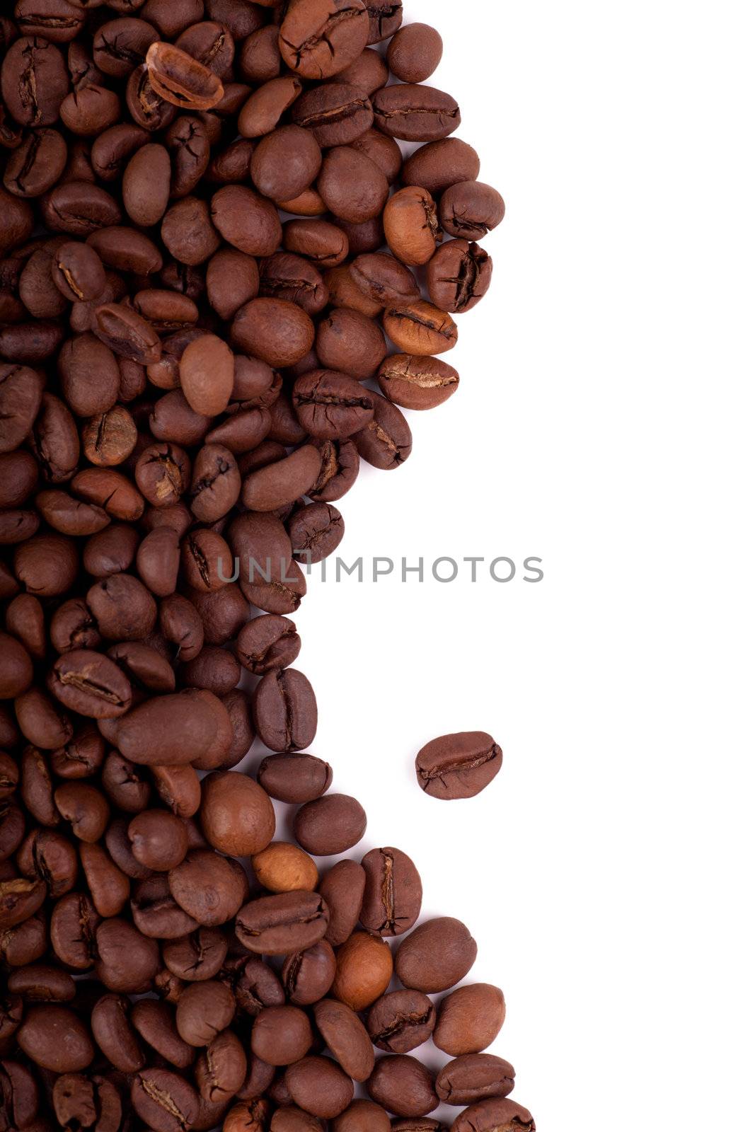 Roasted coffee beans over white background
