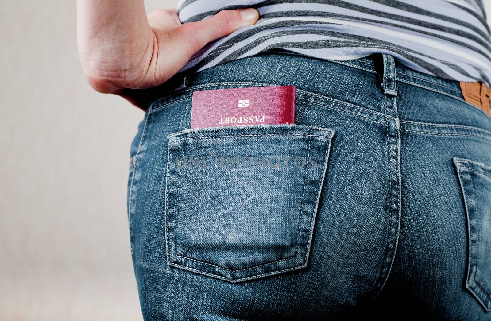 Passport in a back pocket of jeans