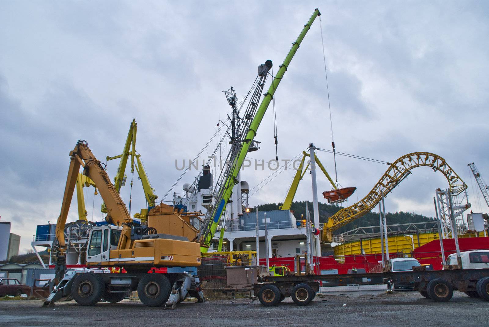 Cranes in action on the halden harbor by steirus