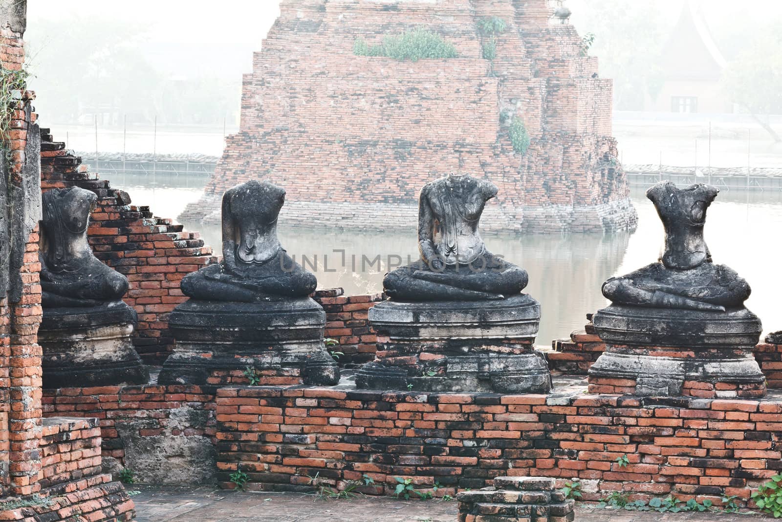 Buddha statues and Floods Chaiwatthanaram Temple at Ayutthaya, Thailand