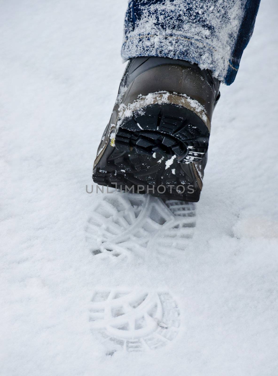boots in the snow during a storm